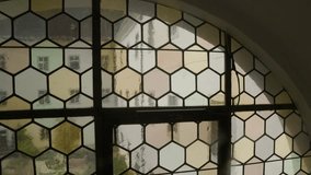 stained glass window in monastery - Powered by Shutterstock - Get 15% off with code: PIKWIZARD15