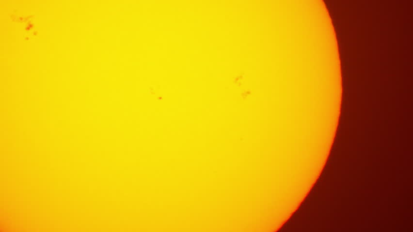 Shot of a Sunspots on the Surface of the Sun. Strong magnetic fields on the surface of the sun Solar flares and coronal mass ejections, CME. Apocalyptic, doomsday end of the world. Real time footage.