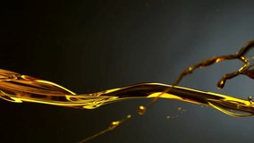 Super Slow Motion Shot of Pouring Oil . Filmed on High Speed Cinematic Camera at 1000 FPS - Powered by Shutterstock - Get 15% off with code: PIKWIZARD15