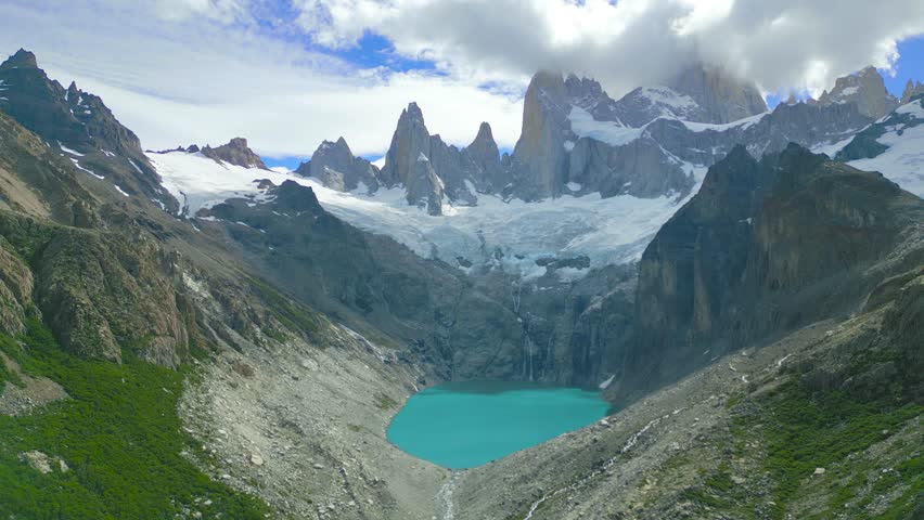 Monte Fitz Roy also known as Cerro Chalten, Cerro Fitz Ro is a mountain in Patagonia, on the border between Argentina and Chile. It is located near the town of El Chalten. Aerial drone view.