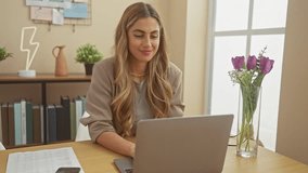 A young blonde woman smiles while using a smartphone and a laptop in a well-lit home office environment. - Powered by Shutterstock - Get 15% off with code: PIKWIZARD15