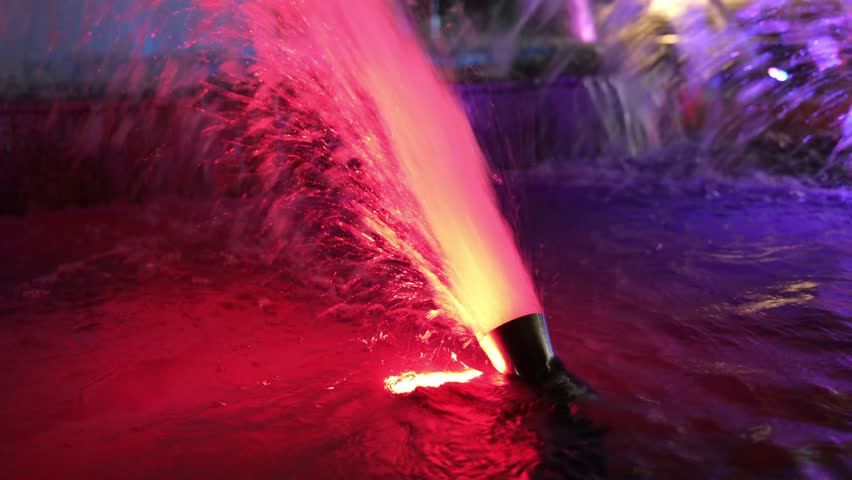 city ​​fountain illuminated at night