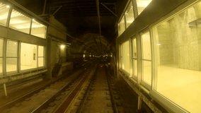 Time lapse of automatic train moving in tunnel for transit from Barcelona to terminal in International Airport. Hyperlapse, POV view of train riding in the subway tunnel - Powered by Shutterstock - Get 15% off with code: PIKWIZARD15