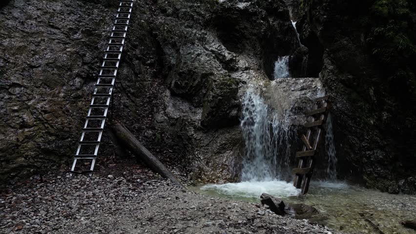 Gorgeous nature of Slovak Paradise park, waterfall on the side of the hill, 4k