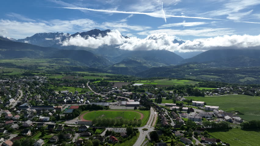 Picturesque La Mure with lush landscapes, mountains, and a sports facility