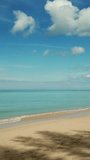 Aerial video of beauty deserted beach and calm sea in Thailand. Vertical video