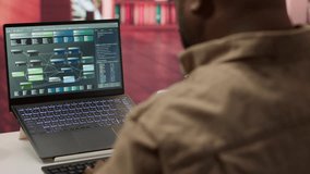 Professional software developer at desk working on AI coding and machine learning projects, showcasing innovation in software development and digital business. Internet of things. Camera A. - Powered by Shutterstock - Get 15% off with code: PIKWIZARD15