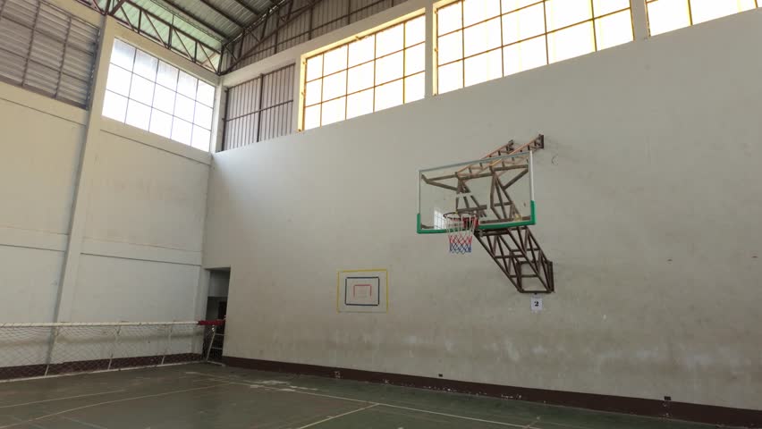 Abandoned Sports Facility: Empty Basketball Court