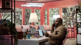 Business administrator discussing with the investors on phone call, communicating the sales numbers and performance metrics during analysis. Entrepreneur hoping to obtain new funds. Camera B. - Powered by Shutterstock - Get 15% off with code: PIKWIZARD15