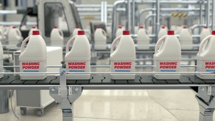 Manufacturing conveyor belt moving the chemical product. Manufacturing the chemical washing powder on the conveyor line. Factory conveyor deals with chemical cleaning goods manufacturing. Industry