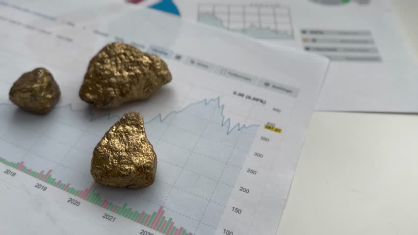 Investment sources on stock markets and financial concept: Front view on a silver bitcoin, crypto currency and a real raw gold piece. Objects reflection on black background with copy space.