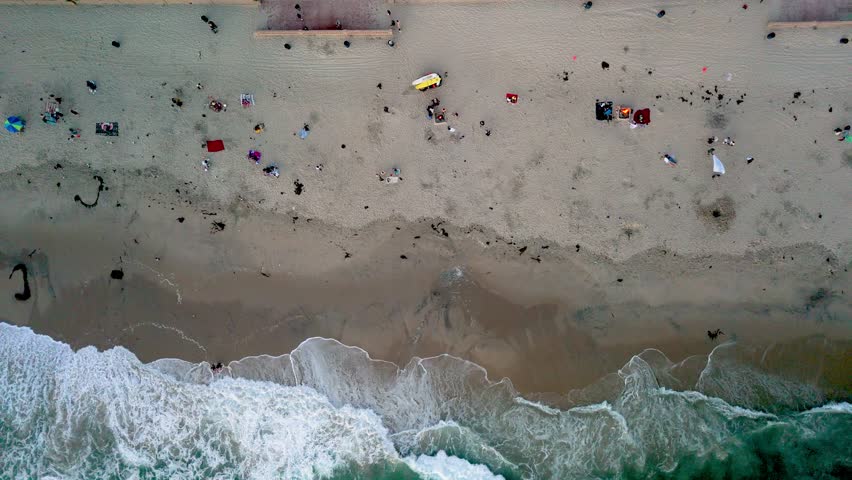 People are Delighting in the Summer Season at Mission Beach, San Diego, California, USA - Aerial Topdown Shot