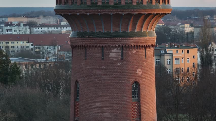 A drone footage of the Water Tower (Wasserturm) in Forst (Lausitz) town at sunrise in Lower Lusatia, Brandenburg, Germany