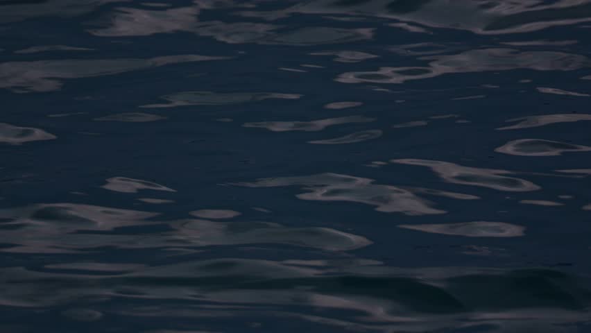 Aerial view Top down dark waves sea surface view nature ocean waves background	