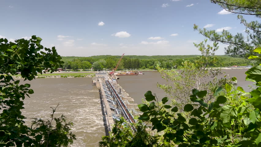 Peeking through the trees with views of a large hydroelectric dam on the Illinois River. Located within Starved Rock State Park in LaSalle County, Illinois.