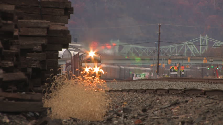 A freight train approaches.