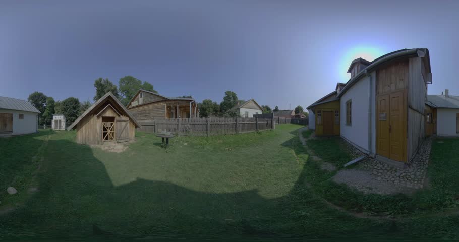 This 360- degree virtual tour takes you on a journey through a traditional village, showcasing its quaint wooden houses and rustic barn. The tour begins with a panoramic view of the village , with