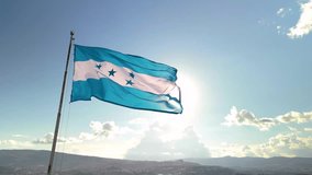 Flag of Honduras with the sun in the background in a sunset - Powered by Shutterstock - Get 15% off with code: PIKWIZARD15