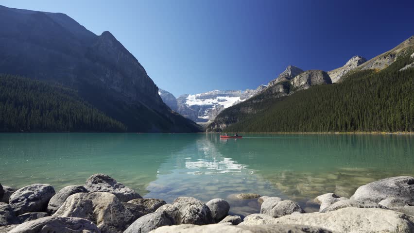 Lake Louise in fall season. Banff National Park beautiful landscape. Canadian Rockies Autumn Scenery. Alberta, Canada.