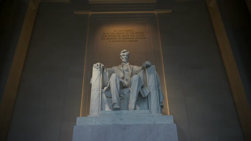 The white marble of Abraham Lincoln at the Lincoln Memorial in Washington DC