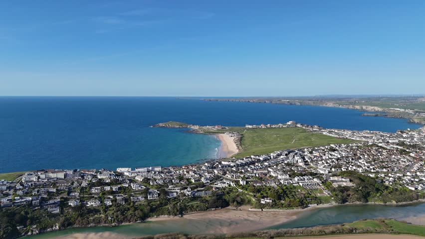 Fistral Beach on the north coast of Cornwall, England, UK, next to Newquay. Summers day with blue sky and turquoise water filmed with a 4K drone.