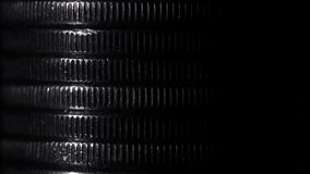 Stack of silver coins in close-up, texture of old coins, light movements, dark background - Powered by Shutterstock - Get 15% off with code: PIKWIZARD15