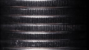 Stack of silver coins in close-up, texture of old coins, light movements, dark background - Powered by Shutterstock - Get 15% off with code: PIKWIZARD15