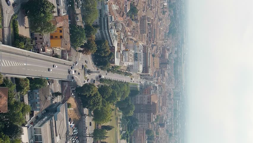 Vertical video. Piacenza, Italy - July 14, 2023: Historical city center. Summer day, Aerial View, Departure of the camera