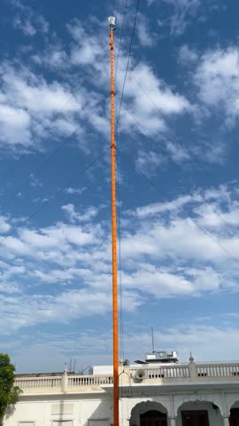 Beautiful vertical view of Nishan Sahib, Respected symbol in Sikhism