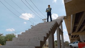 Engineer or technician inspecting bridge construction for transportation system, engineering concept, construction, infrastructure system. - Powered by Shutterstock - Get 15% off with code: PIKWIZARD15
