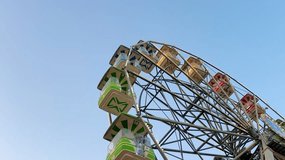 Ferris wheel on a sunny day. Amusement park fun - Powered by Shutterstock - Get 15% off with code: PIKWIZARD15