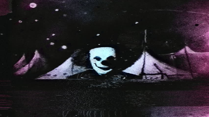 Creepy spooky clown with dust and scratches on tv scrren glitch effect