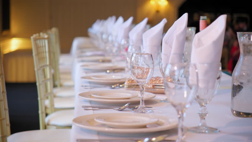 Wedding decor set up catering dinner dish event. fine setting table row chair 
