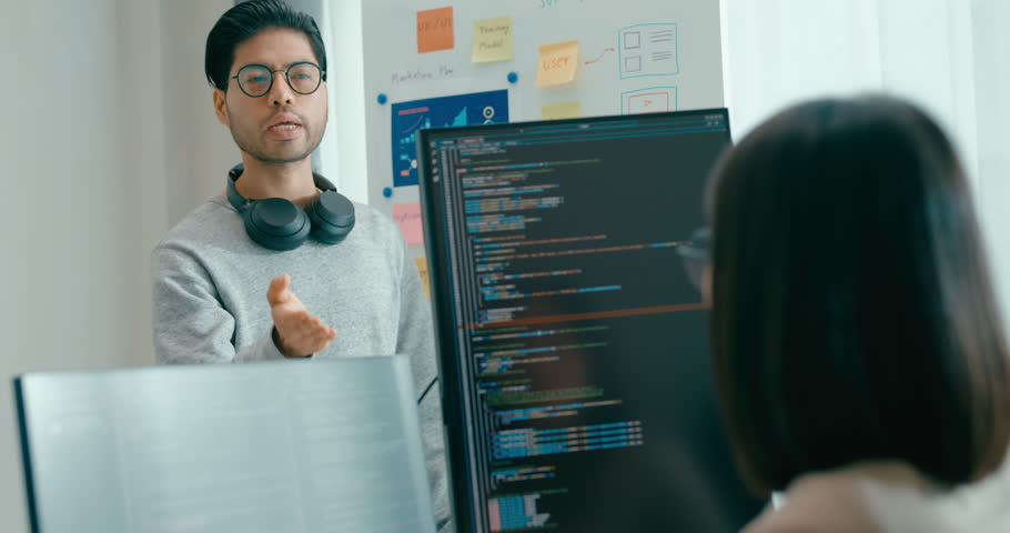 Group adult Asia male female software developers mentor leader manager talk strategy plan to executive write prompt AI bot IT app program nomad, video game, data center. Whiteboard slideshow code.