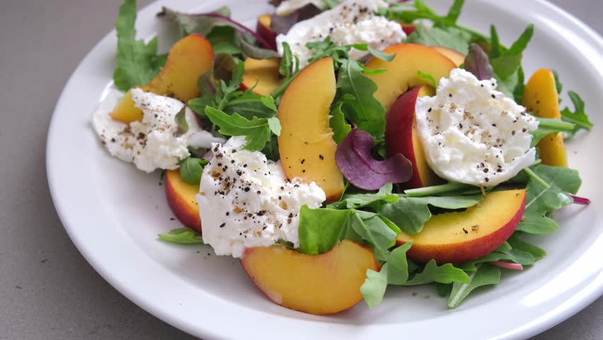 Summer burrata with peach salad.