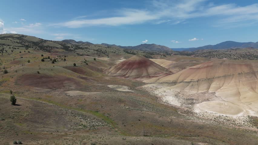 A drone footage of Painted Hills and John Day Fossil Beds Park on a sunny day in east-central Oregon, United States