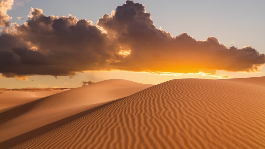 Timelapse of sunset over the sand dunes in the desert. Sahara desert