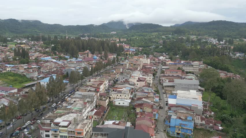 One minute aerial view of the town of Berastagi at Tanah Karo. Famous tourism disctrict at North Sumatera, Indonesia