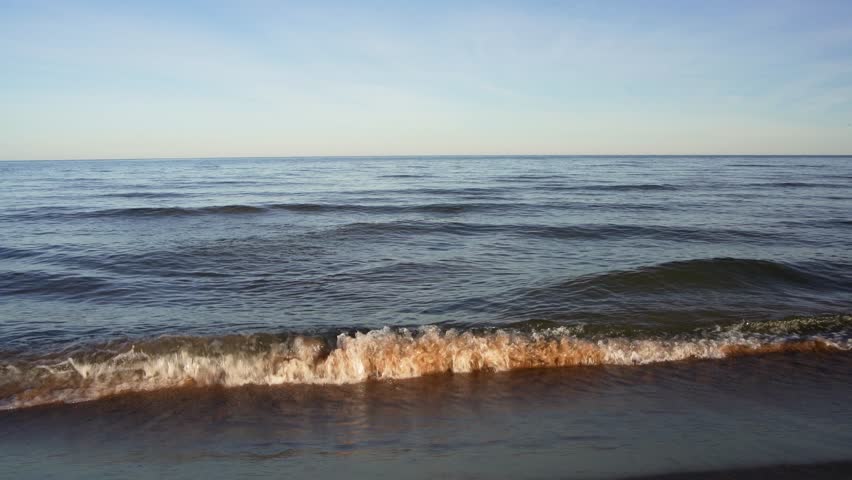 4K video of waves crashing on the shore of Lake Michigan. 