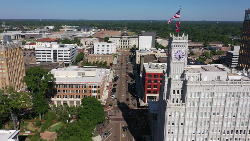 Sunny afternoon view of the historic buildings and skyline of downtown Jackson, Mississippi, USA.