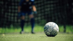 Close-up of a Football Player Taking a Penalty Shot - Powered by Shutterstock - Get 15% off with code: PIKWIZARD15