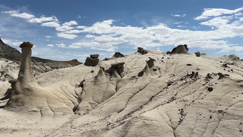 Hiking in Bisti Badlands near Farmington New Mexico, Bisti De Na Zin Wilderness, authentic natural landscape scenery, otherworldly, Mars surface, mysterious, Venus surface, extraterrestrial, untouched
