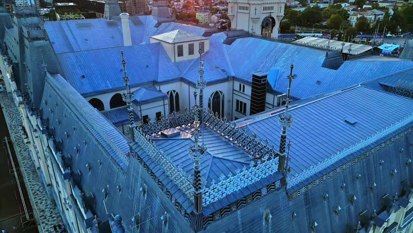Aerial drone view of Iasi Palace at sunset, Romania. Palace made in classic style and multiple buildings around it
