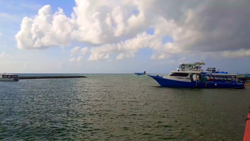 Huraa Island - Maldives - seaplane taking off from the harbor