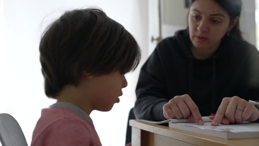 Child counting with fingers while parent explains, focusing on interactive learning and hands-on education, emphasizing the importance of detailed guidance in a home setting