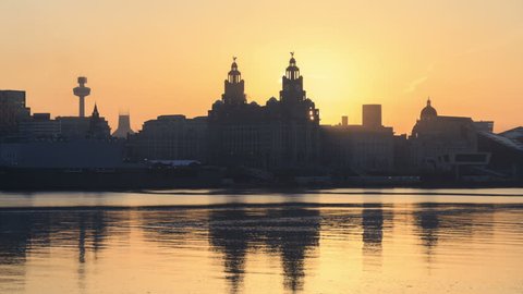 Timelapse slow zoom of sunrise over Liverpool Liver Building