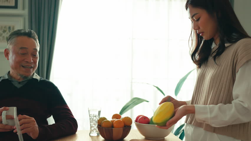 mother day family relation bonding at home asian family mother father and daughter enjoy cuddle conversation morning lifestyle hapiness joyful moment while stay at kitchen area home love bonding