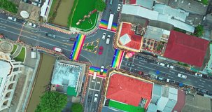 Phuket,Thailand,June,27,2024: Aerial view A dramatic day filled with colorful Organizing a celebration of love Phuket pride 2024. Rainbow colors decorated in Phuket Town.clock tower check in point
