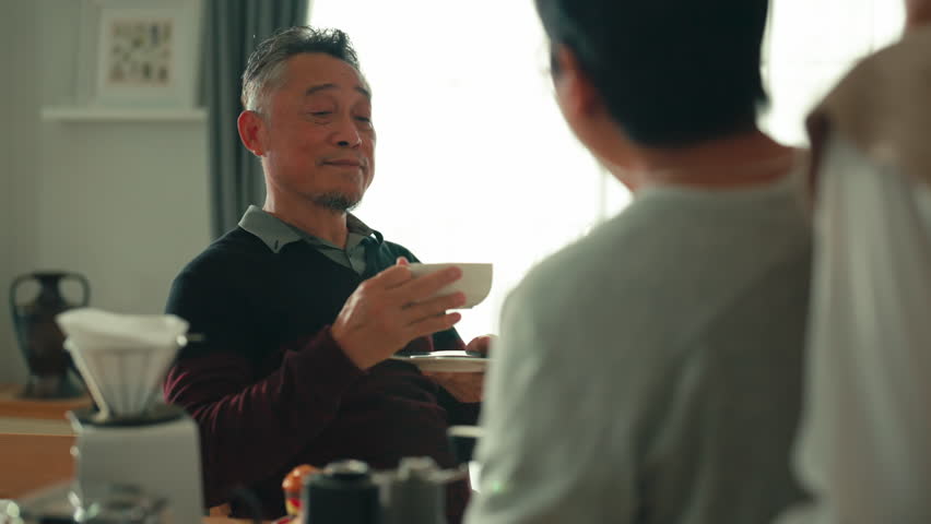 mother day family relation bonding at home asian family mother father and daughter enjoy cuddle conversation morning lifestyle hapiness joyful moment while stay at kitchen area home love bonding