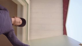 Home delivery of package by courier company, upwards ground-level view - Powered by Shutterstock - Get 15% off with code: PIKWIZARD15